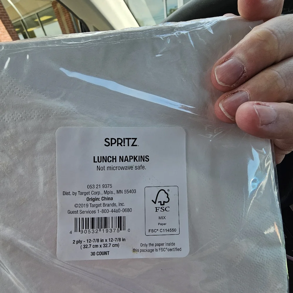 15 packs of various size napkins and themes
